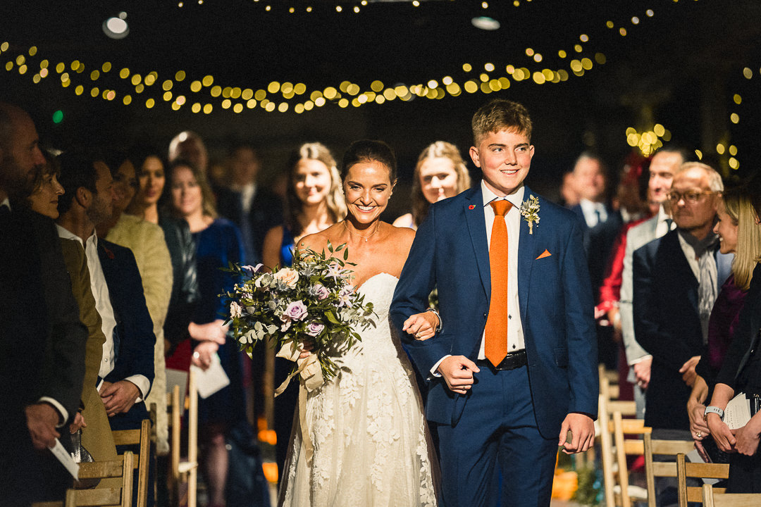 bride walked down the aisle by her son at the electricity shop wedding venue in London