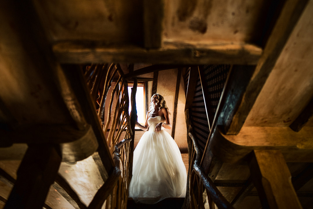 Candid photograph of bride getting ready at Ridge Farm Sussex